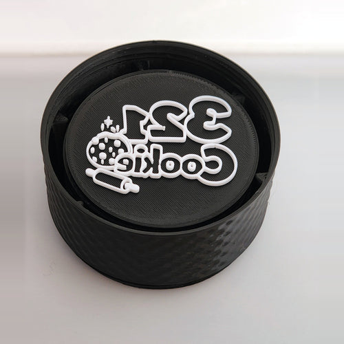 12-Disc Case seen at an angle with a white 321 Cookie logo disc inside