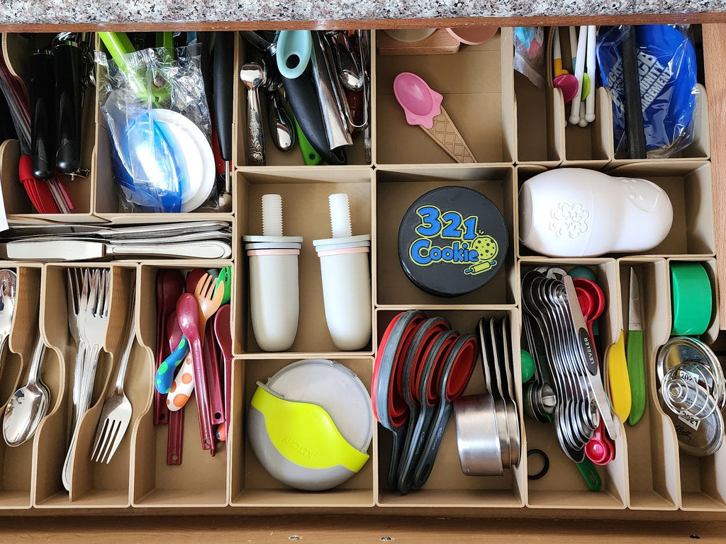 The same kitchen drawer with the cutters gone and just the Storage Stack in its compartment